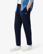 Pantaloni della tuta felpato XH8869 LACOSTE